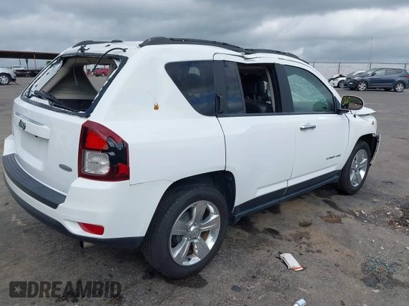 2016 Jeep Compass High Altitude Edition with VIN 1C4NJCEA9GD615042, listed as a IAAI auction lot 41898022 with 95,327 mi miles. Bid and sale history available at carsss.com. Image 4.