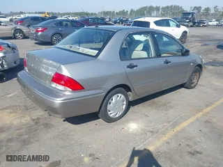2003 Mitsubishi Lancer ES with VIN JA3AJ26E63U007501, listed as a IAAI auction lot 41771016 with 146,984 mi miles. Bid and sale history available at carsss.com. Image 4.