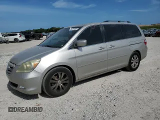 2006 Honda Odyssey Touring z VIN 5FNRL38856B028705, wystawiony jako Copart lot #58711055 z przebiegiem 188 947 mil mil oraz Szkoda całkowita • Salvage title. Historia ofert i sprzedaży dostępna na DreamBid. Obrazek 1.