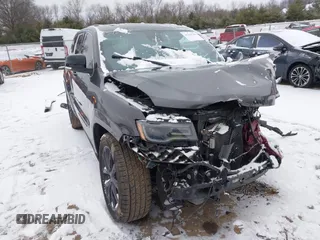 2016 Jeep Grand Cherokee High Altitude with VIN 1C4RJFCGXGC417764, listed as a IAAI auction lot 41242730 with 124,139 mi miles. Bid and sale history available at carsss.com. Image 1.