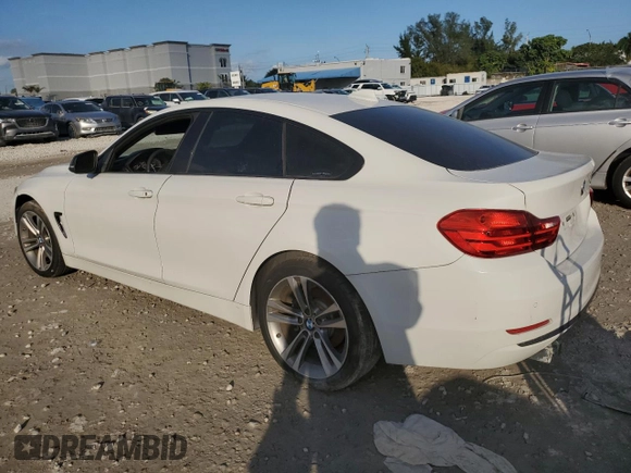 2015 BMW 4 Series 428i with VIN WBA4A5C50FG052177, listed as a Copart auction lot 86093994 with 127,956 mi miles and Salvage Title. Bid and sale history available at DreamBid. Image 2.