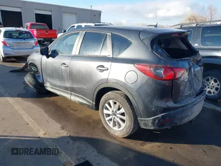 2016 Mazda CX-5 Touring with VIN JM3KE4CY0G0751040, listed as a IAAI auction lot 41290780 with 136,689 mi miles. Bid and sale history available at carsss.com. Image 3.