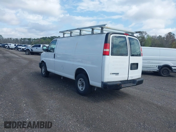 2013 Chevrolet Express Cargo with VIN 1GCWGFBA7D1110560, listed as a IAAI auction lot 41730234 with 185,291 mi miles and . Bid and sale history available at DreamBid. Image 3.
