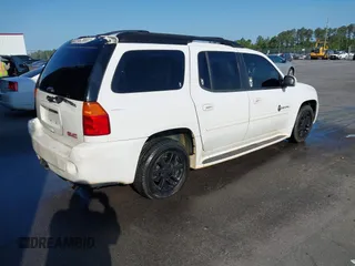 2006 GMC Envoy XL Denali with VIN 1GKES66M566159202, listed as a IAAI auction lot 41988276 with 293,983 mi miles. Bid and sale history available at carsss.com. Image 4.