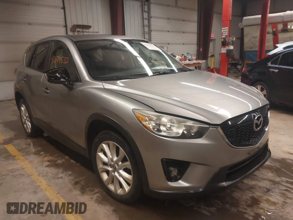 2014 Mazda CX-5 Grand Touring with VIN JM3KE4DY5E0305882, listed as a IAAI auction lot 41879532 with 173,443 mi miles. Bid and sale history available at carsss.com. Image 1.