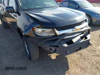2020 Chevrolet Colorado 4WD Work Truck z VIN 1GCGTBENXL1212795, wystawiony jako IAAI lot #42249330 z przebiegiem 46 900 mil mil oraz . Historia ofert i sprzedaży dostępna na DreamBid. Obrazek 6.