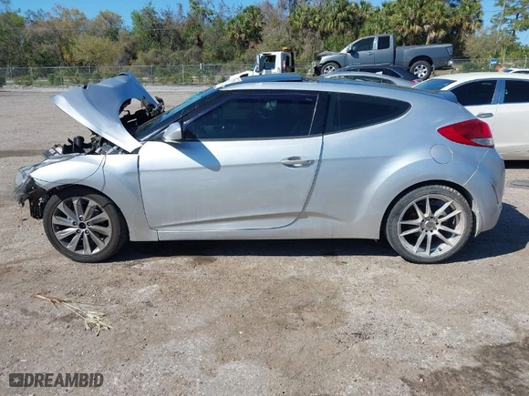 2012 Hyundai Veloster w/Black Int with VIN KMHTC6ADXCU036070, listed as a IAAI auction lot 41779990 with 1 mi miles. Bid and sale history available at carsss.com. Image 14.