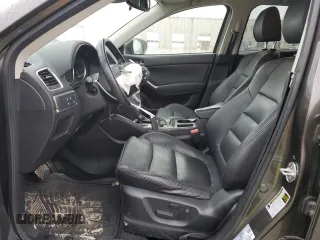 2016 Mazda CX-5 Grand Touring with VIN JM3KE2DY4G0811386, listed as a Copart auction lot 51961795 with 99,525 mi miles and Salvage Title. Bid and sale history available at carsss.com. Image 7.