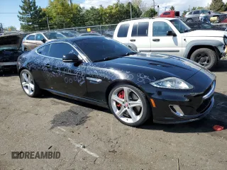 2014 Jaguar XK with VIN SAJWA4DC6EMB53957, listed as a Copart auction lot 71195744 with 44,054 mi miles and Clean Title. Bid and sale history available at carsss.com. Image 4.