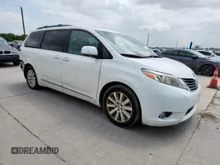 2015 Toyota Sienna XLE with VIN 5TDYK3DC4FS617099, listed as a Copart auction lot 61128025 with 114,508 mi miles and Salvage title. Bid and sale history available at DreamBid. Image 4.