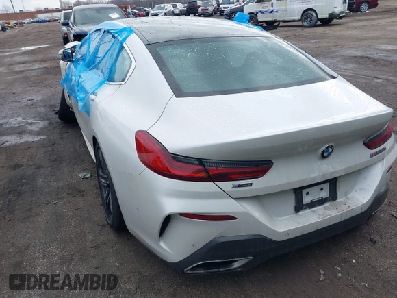 2022 BMW 8 Series M850i with VIN WBAGV8C07NCJ68473, listed as a IAAI auction lot 41153583 with 4,150 mi miles. Bid and sale history available at carsss.com. Image 3.
