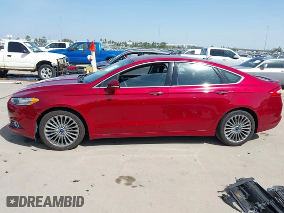 2014 Ford Fusion Titanium with VIN 3FA6P0K92ER293480, listed as a IAAI auction lot 41792642 with 156,828 mi miles. Bid and sale history available at carsss.com. Image 15.