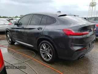 2021 BMW X4 M40i with VIN 5UX2V5C08M9E17162, listed as a Copart auction lot 67602073 with 33,879 mi miles. Bid and sale history available at carsss.com. Image 2.