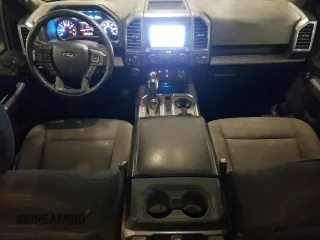 2020 Ford F-150 XL with VIN 1FTFW1E49LFC33659, listed as a Copart auction lot 52859575 with 104,623 mi miles and Salvage Title. Bid and sale history available at carsss.com. Image 8.
