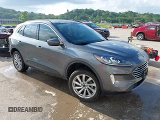 2022 Ford Escape Titanium with VIN 1FMCU9J90NUB35428, listed as a IAAI auction lot 42255369 with 33,662 mi miles and . Bid and sale history available at DreamBid. Image 1.
