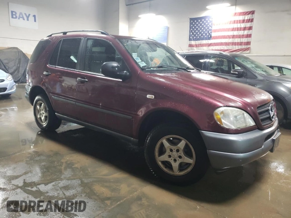 1998 Mercedes-Benz M-Class with VIN 4JGAB54E1WA034383, listed as a Copart auction lot 80363374 with 122,125 mi miles and Salvage Title. Bid and sale history available at carsss.com. Image 4.
