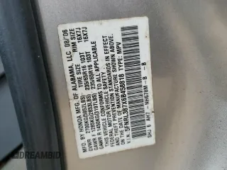 2006 Honda Odyssey EX-L z VIN 5FNRL387X6B458818, wystawiony jako Copart lot #61801335 z przebiegiem 227 179 mil mil oraz Czysty tytuł • Clean title. Historia ofert i sprzedaży dostępna na DreamBid. Obrazek 13.