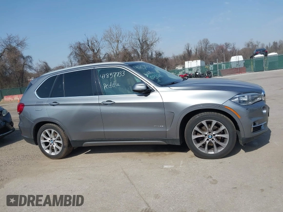 2015 BMW X5 xDrive35i with VIN 5UXKR0C53F0K60910, listed as a IAAI auction lot 41857733 with 153,583 mi miles. Bid and sale history available at carsss.com. Image 13.