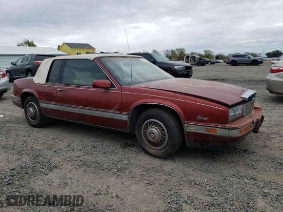 1986 Cadillac Eldorado z VIN 1G6EL5784GU616263, wystawiony jako Copart lot #48741325 z przebiegiem 59 213 mil mil oraz Tytuł czysty. Historia ofert i sprzedaży dostępna na DreamBid. Obrazek 4.