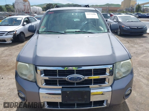 2008 Ford Escape XLT with VIN 1FMCU93128KA42482, listed as a IAAI auction lot 41979106 with 292,130 mi miles. Bid and sale history available at carsss.com. Image 6.