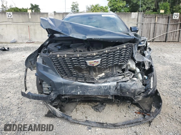 2020 Cadillac XT5 Premium Luxury AWD with VIN 1GYKNDRS2LZ146688, listed as a Copart auction lot 51692705 with 74,689 mi miles and Non Repairable. Bid and sale history available at DreamBid. Image 5.