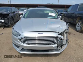 2017 Ford Fusion SE z VIN 3FA6P0HD0HR129175, wystawiony jako IAAI lot #42126532 z przebiegiem 120 424 mil mil oraz . Historia ofert i sprzedaży dostępna na DreamBid. Obrazek 12.