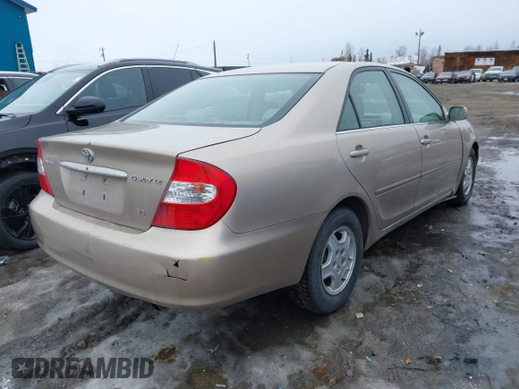 2002 Toyota Camry XLE z VIN 4T1BF32K42U533788, wystawiony jako IAAI lot #42024918 z przebiegiem 120 168 mil mil oraz . Historia ofert i sprzedaży dostępna na DreamBid. Obrazek 4.