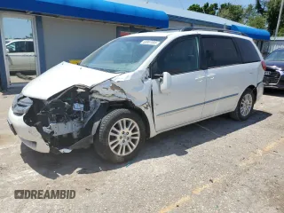 2009 Toyota Sienna XLE with VIN 5TDZK22C19S257618, listed as a Copart auction lot 60067085 with Not provided miles and Salvage title. Bid and sale history available at DreamBid. Image 1.