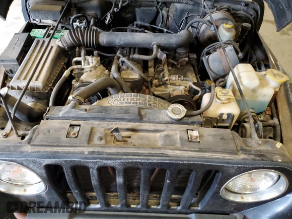 1997 Jeep Wrangler Sport with VIN 1J4FY19S8VP471139, listed as a Copart auction lot 60664255 with 126,710 mi miles and Clean title. Bid and sale history available at DreamBid. Image 12.