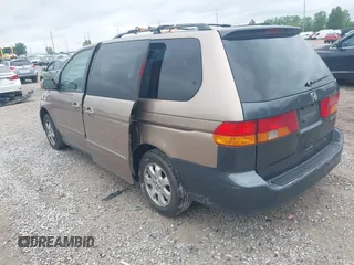 2003 Honda Odyssey EX-L z VIN 5FNRL18973B122173, wystawiony jako IAAI lot #42252018 z przebiegiem 204 487 mil mil oraz . Historia ofert i sprzedaży dostępna na DreamBid. Obrazek 3.
