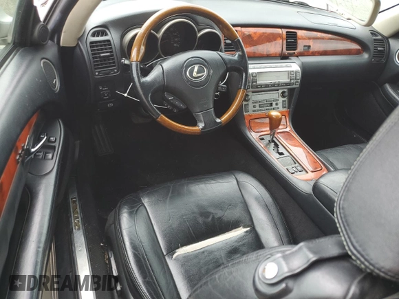 2002 Lexus SC 430 with VIN JTHFN48Y420018791, listed as a Copart auction lot 61790145 with 130,872 mi miles and Salvage title. Bid and sale history available at DreamBid. Image 8.