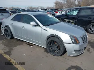 2012 Cadillac CTS with VIN 1G6DA5E55C0140374, listed as a IAAI auction lot 41627332 with 118,466 mi miles and . Bid and sale history available at DreamBid. Image 1.