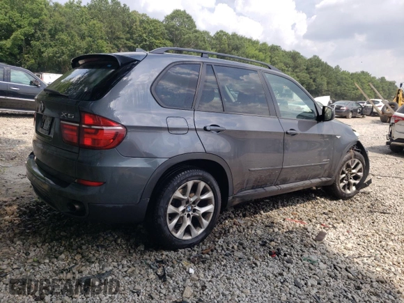 2012 BMW X5 35i z VIN 5UXZV4C55CL753810, wystawiony jako Copart lot #62405565 z przebiegiem 178 504 mil mil oraz Szkoda całkowita • Salvage title. Historia ofert i sprzedaży dostępna na DreamBid. Obrazek 3.