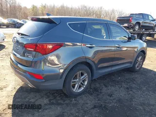 2017 Hyundai Santa Fe 2.4L with VIN 5XYZTDLB0HG453575, listed as a IAAI auction lot 41036334 with 114,031 mi miles and . Bid and sale history available at DreamBid. Image 4.
