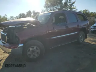 2004 GMC Yukon SLE with VIN 1GKEK13V14J215792, listed as a Copart auction lot 75657614 with 0 mi miles and Salvage Title. Bid and sale history available at carsss.com. Image 1.