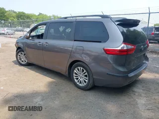 2015 Toyota Sienna XLE with VIN 5TDYK3DC6FS553695, listed as a IAAI auction lot 42418507 with 137,677 mi miles and . Bid and sale history available at DreamBid. Image 3.