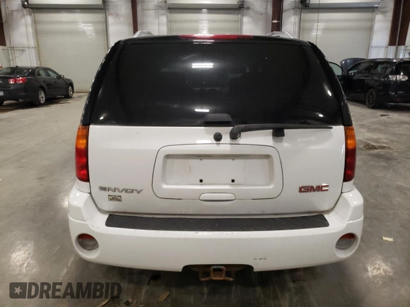 2009 GMC Envoy SLT with VIN 1GKDT43S492124405, listed as a Copart auction lot 81337354 with 154,045 mi miles and Salvage Title. Bid and sale history available at carsss.com. Image 6.