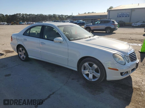 2007 Mercedes-Benz E 550 with VIN WDBUF72X37B021084, listed as a Copart auction lot 48695235 with 119,538 mi miles and Salvage Title. Bid and sale history available at DreamBid. Image 4.