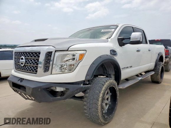 2016 Nissan Titan Platinum Reserve с VIN 1N6BA1F21GN513109, выставлен на аукционе Copart как лот 56116825 с пробегом 94 263 миль миль и Чистый • Clean title. История ставок и продаж доступна на DreamBid. Изображение 1.