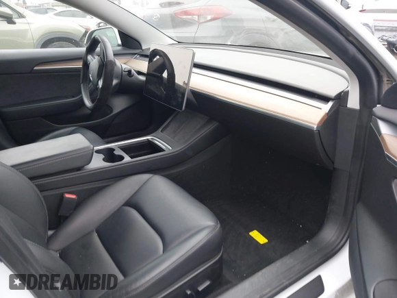 2022 Tesla Model 3 with VIN 5YJ3E1EA7NF108758, listed as a IAAI auction lot 41824437 with Not Provided miles. Bid and sale history available at carsss.com. Image 5.