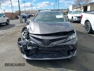 2020 Toyota Camry LE with VIN 4T1C11AK3LU363417, listed as a IAAI auction lot 41430382 with 130,837 mi miles. Bid and sale history available at carsss.com. Image 13.