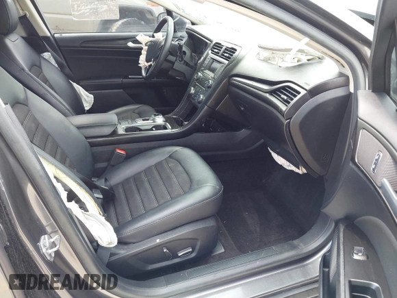 2018 Ford Fusion Hybrid SE with VIN 3FA6P0LU1JR116139, listed as a IAAI auction lot 41933594 with 83,000 mi miles. Bid and sale history available at carsss.com. Image 5.