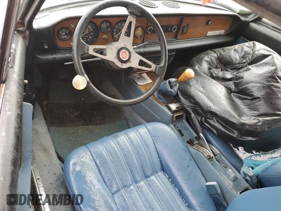 1980 FIAT 124 Spider z VIN 124CS000167543, wystawiony jako Copart lot #53031904 z przebiegiem 60 115 mil mil oraz Nie do naprawy • Non repairable. Historia ofert i sprzedaży dostępna na DreamBid. Obrazek 8.