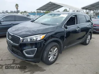 2016 Kia Sorento LX with VIN 5XYPGDA39GG153135, listed as a IAAI auction lot 41903352 with 144,557 mi miles. Bid and sale history available at carsss.com. Image 2.