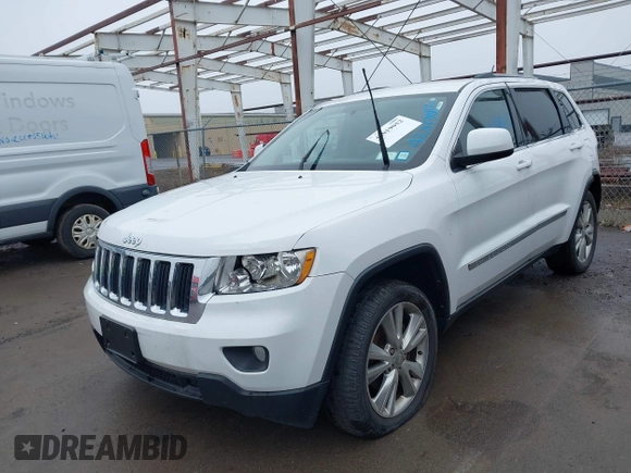 2013 Jeep Grand Cherokee Laredo with VIN 1C4RJFAG6DC557163, listed as a IAAI auction lot 42019052 with 125,058 mi miles. Bid and sale history available at carsss.com. Image 17.