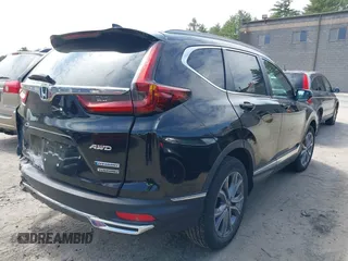2020 Honda CR-V Touring with VIN 7FART6H96LE023782, listed as a IAAI auction lot 42053948 with 56,814 mi miles and . Bid and sale history available at DreamBid. Image 4.