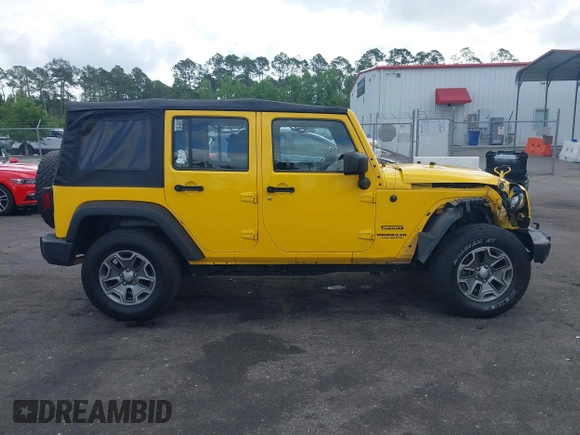 2015 Jeep Wrangler Unlimited Willys Wheeler with VIN 1C4BJWDG2FL643375, listed as a IAAI auction lot 42109724 with 112,357 mi miles and . Bid and sale history available at DreamBid. Image 13.