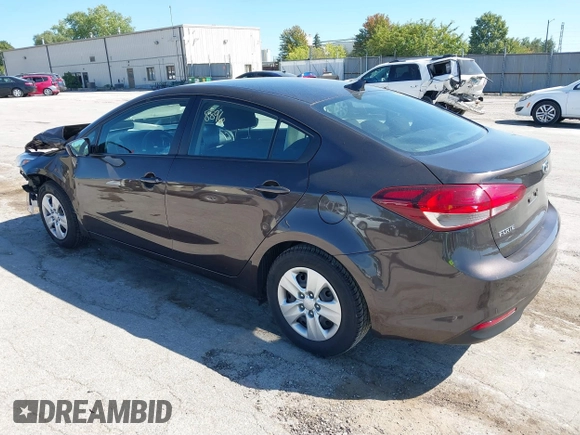 2018 Kia Forte LX with VIN 3KPFK4A70JE217385, listed as a IAAI auction lot 39955381 with 99,060 mi miles. Bid and sale history available at carsss.com. Image 3.