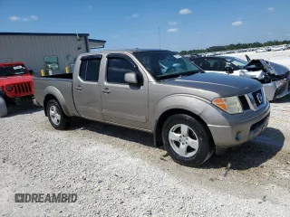 2007 Nissan Frontier SE with VIN 1N6AD09U47C428934, listed as a Copart auction lot 51522874 with 207,195 mi miles and Salvage title. Bid and sale history available at DreamBid. Image 4.