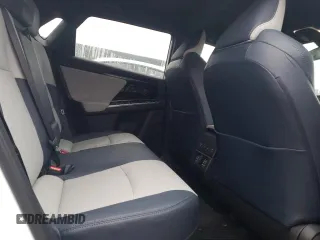 2023 Subaru Solterra Limited z VIN JTMABABA7PA022169, wystawiony jako Copart lot #43947795 z przebiegiem 18 415 mil mil oraz Szkoda całkowita • Salvage title. Historia ofert i sprzedaży dostępna na DreamBid. Obrazek 11.